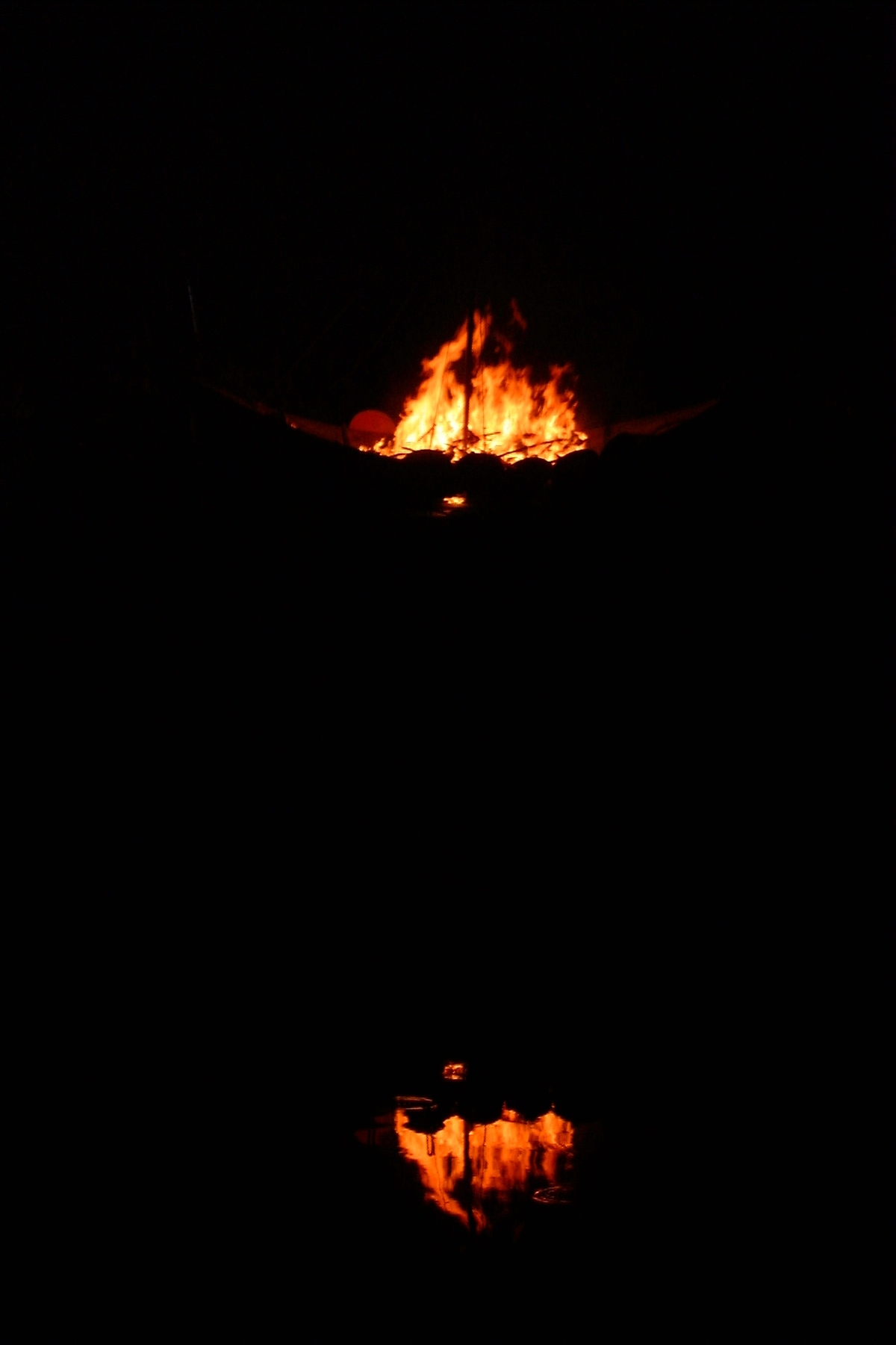 Amlwch 2004 (Gorm) burning boat reflection 5.jpg